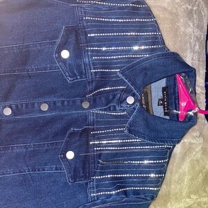 A beautiful jean dress with a beading on the shoulders really fitting